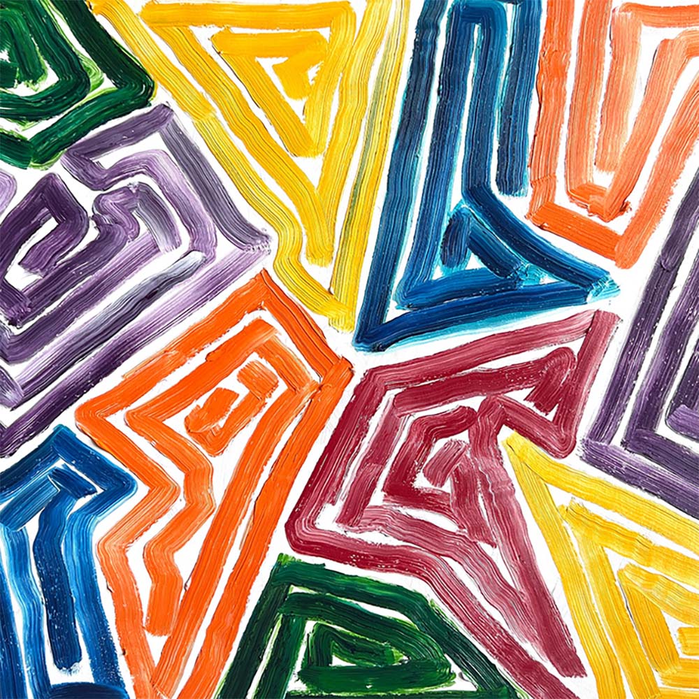 Colorful abstract geometric artwork with overlapping angular shapes in green, yellow, blue, orange, purple, and red on a white background.