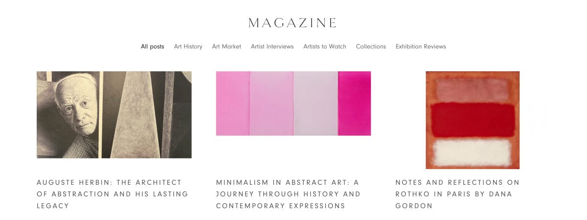 A magazine webpage layout with the title 'MAGAZINE' at the top, navigation links, and three article thumbnails with abstract artwork and text. The center thumbnail shows a pink artwork.